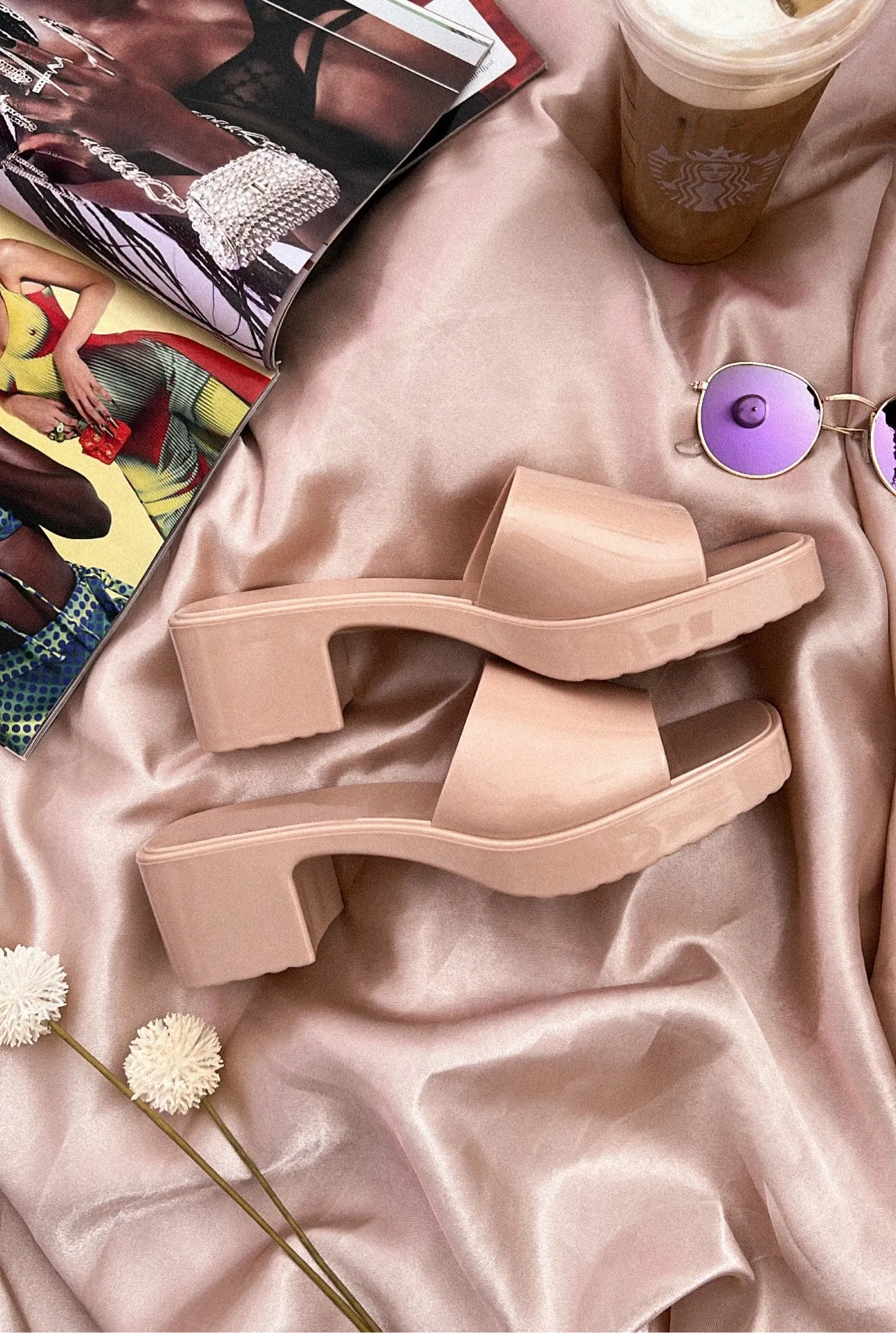 Barbie’s glossy sandals