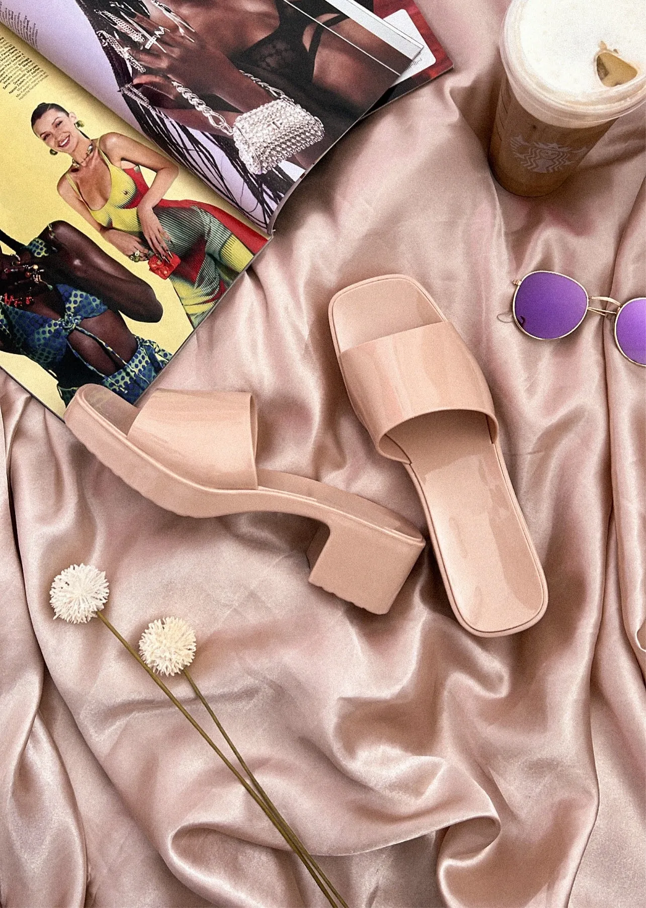 Barbie’s glossy sandals